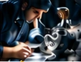 Technician inspecting an automotive component